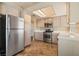 Modern kitchen includes stainless steel appliances, light wood cabinets at 4517 Rodman Dr, Las Vegas, NV 89130