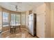 Eat-in kitchen with stainless steel refrigerator and natural lighting at 4517 Rodman Dr, Las Vegas, NV 89130