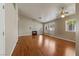 Large living room with fireplace, high ceilings and hardwood floors at 4517 Rodman Dr, Las Vegas, NV 89130