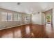 Spacious open-concept living room with hardwood floors and high ceilings at 4517 Rodman Dr, Las Vegas, NV 89130