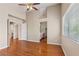 Spacious main bedroom with high ceilings and hardwood floors provides ample room at 4517 Rodman Dr, Las Vegas, NV 89130