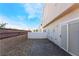 Private backyard patio with block wall, perfect for relaxing and entertaining outdoors at 4608 Snake Eyes St # 102, Las Vegas, NV 89122