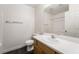 Bright bathroom with white countertop and vanity, plus a mirrored view into the shower at 4608 Snake Eyes St # 102, Las Vegas, NV 89122