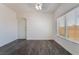 Bright bedroom with modern hardwood floors, window view and ample closet space at 4608 Snake Eyes St # 102, Las Vegas, NV 89122