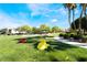Community park featuring playground, walking paths and picnic tables in lush landscaping at 4608 Snake Eyes St # 102, Las Vegas, NV 89122