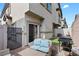 Charming patio with an outdoor lounge area, grill, and easy access to the house at 4650 Ridgeley Ave # 103, North Las Vegas, NV 89084