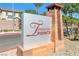 Tucana Pointe community sign with a well-maintained landscape, street view, and clear blue skies at 4650 Ridgeley Ave # 103, North Las Vegas, NV 89084