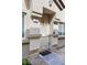 Inviting front entrance with a stylish security screen door and 'Welcome Home' mat, showcasing curb appeal at 4650 Ridgeley Ave # 103, North Las Vegas, NV 89084