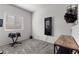 Bright home gym featuring modern equipment, a mirror, and a tidy workout space at 4650 Ridgeley Ave # 103, North Las Vegas, NV 89084