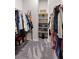 Well-organized walk-in closet with shelving, hanging rods, and plenty of storage space at 4650 Ridgeley Ave # 103, North Las Vegas, NV 89084