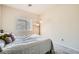Comfortable bedroom with a window, carpet flooring, and natural light, creating a relaxing ambiance at 4720 Flower Moon Ave # 101, North Las Vegas, NV 89084
