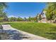 Expansive green space in the community provides a serene setting for outdoor activities and relaxation at 4720 Flower Moon Ave # 101, North Las Vegas, NV 89084