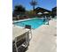 Community pool offers a refreshing escape with ample seating and amenities at 4720 Flower Moon Ave # 101, North Las Vegas, NV 89084