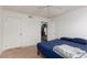 Bedroom featuring neutral carpet and a closet with a full view of the door at 5114 S Jones Blvd # 202, Las Vegas, NV 89118