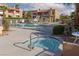 View of the community jacuzzi surrounded by mature landscaping and the community pool at 5114 S Jones Blvd # 202, Las Vegas, NV 89118