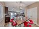 Well-appointed dining area open to the living room, featuring modern furniture and ample light at 52 Vallejo Verde St, Henderson, NV 89012