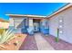 Inviting entryway with a decorative glass door, complemented by a well-maintained front yard at 52 Vallejo Verde St, Henderson, NV 89012