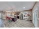 Bright kitchen features a large island, granite countertops, stainless appliances, and custom dark wood cabinets at 52 Vallejo Verde St, Henderson, NV 89012