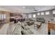 Inviting living room flows into open kitchen area, with comfortable seating and bright natural light at 52 Vallejo Verde St, Henderson, NV 89012