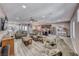 Spacious living room with open concept to kitchen; features lots of natural light and comfortable seating at 52 Vallejo Verde St, Henderson, NV 89012