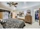 Comfortable bedroom with tile floor, and a large closet at 5202 Willis St, North Las Vegas, NV 89031