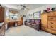 Versatile bonus room with a desk, seating, and a window, offering flexibility for various uses at 5202 Willis St, North Las Vegas, NV 89031