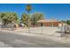 Single-story home with a well-maintained yard and secure fencing at 5202 Willis St, North Las Vegas, NV 89031