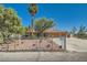 Single-story home with a well-maintained yard and secure fencing at 5202 Willis St, North Las Vegas, NV 89031