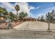 Single-story home with a well-maintained yard and a long driveway at 5202 Willis St, North Las Vegas, NV 89031