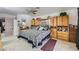 Comfortable main bedroom featuring tile flooring and ample storage with large built-in cabinets at 5202 Willis St, North Las Vegas, NV 89031