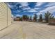 Large concrete yard and access gate with a shed on the left and room to park at 5202 Willis St, North Las Vegas, NV 89031