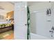A peek into the bathroom, through a door, featuring tub and shower at 5576 W Rochelle Ave # 27C, Las Vegas, NV 89103
