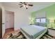 Bedroom featuring a ceiling fan, carpet and a queen sized bed at 5576 W Rochelle Ave # 27C, Las Vegas, NV 89103