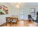 Cozy dining space featuring a table with chairs, artwork, and natural light at 5576 W Rochelle Ave # 27C, Las Vegas, NV 89103