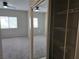 Spacious bedroom with ceiling fan and closet at 5655 E Sahara Ave # 2020, Las Vegas, NV 89142