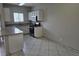 Functional kitchen featuring white cabinets and modern appliances at 5655 E Sahara Ave # 2020, Las Vegas, NV 89142