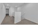 Bright hallway with neutral carpet and white walls at 5960 Addy Ln, North Las Vegas, NV 89081