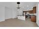 Bright kitchen with stainless steel appliances, granite countertops, and a breakfast bar open to the living space at 5960 Addy Ln, North Las Vegas, NV 89081