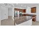 Charming kitchen featuring stainless steel appliances, granite countertops and tiled floors with natural light at 5960 Addy Ln, North Las Vegas, NV 89081