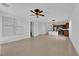 Open floor plan, with views of kitchen and living room, featuring tiled floors and lots of natural light at 5960 Addy Ln, North Las Vegas, NV 89081