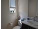 Well-lit half bathroom, features stylish sink, and decorative accents at 6830 Truffle Gray St, Las Vegas, NV 89148