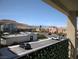 Beautiful community view with well-maintained buildings, parking, and mountain backdrop at 6830 Truffle Gray St, Las Vegas, NV 89148