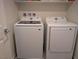 Convenient laundry room setup with a modern washer and dryer at 6830 Truffle Gray St, Las Vegas, NV 89148