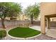 Well maintained backyard with patio and low maintenance turf at 7047 Sombra Way, Las Vegas, NV 89113