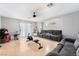 Bright bonus room featuring comfortable seating and ample natural light at 7047 Sombra Way, Las Vegas, NV 89113