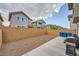 Backyard with gravel, concrete, and a privacy wall surrounding the property at 707 Cottonwood Hill Pl, Henderson, NV 89011