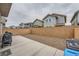 Spacious backyard with gravel and concrete, enclosed by a brick wall for privacy at 707 Cottonwood Hill Pl, Henderson, NV 89011