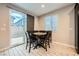 Cozy dining area featuring a table, chairs, and a sliding glass door leading to the outdoor space at 707 Cottonwood Hill Pl, Henderson, NV 89011