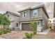A charming two-story house featuring a well-maintained landscape and inviting facade at 707 Cottonwood Hill Pl, Henderson, NV 89011
