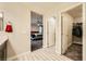 This hallway has access to the bathroom with double sinks, the main bedroom and the walk-in closet at 707 Cottonwood Hill Pl, Henderson, NV 89011